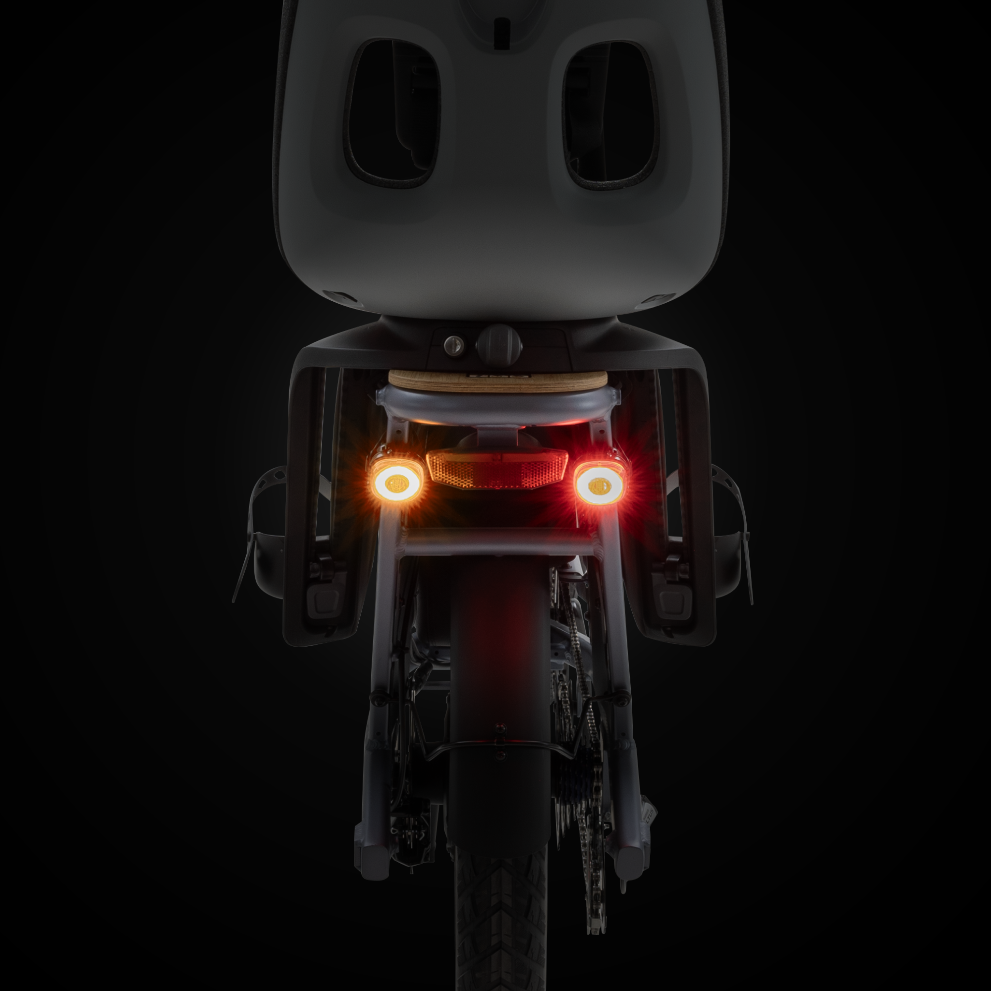 Lumos Firefly Smart Light Bundle mounted on a bicycle with yellow, white, and red lights