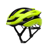 Lumos Ultra Fly Pro yellow road bike helmet with sleek design for improved airflow.